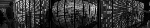 a tryptich showing people in front of a video screen made of LEDs, seeing themselves in motion